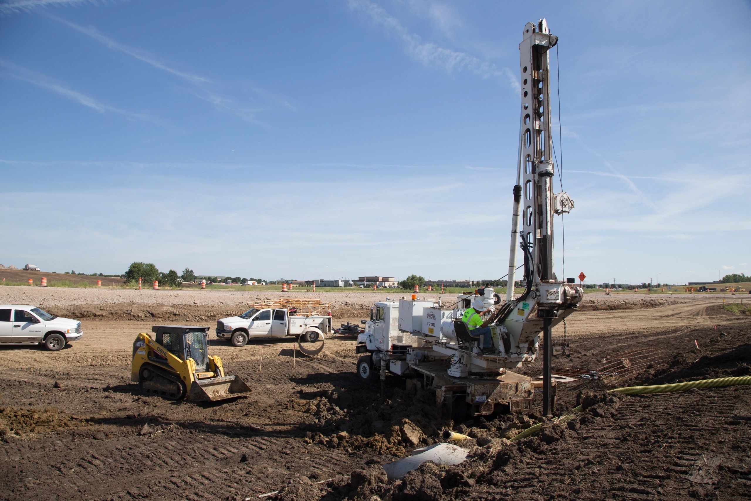 Action Electric Company Sioux Falls foundation drilling crew on a jobsite