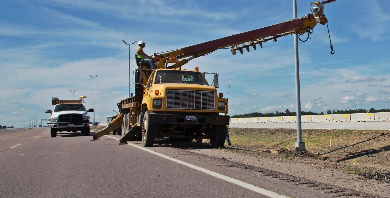 Pressure digger drilling a Sioux Falls foundation pier